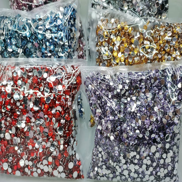 Bulk mixed size bags of rhinestones